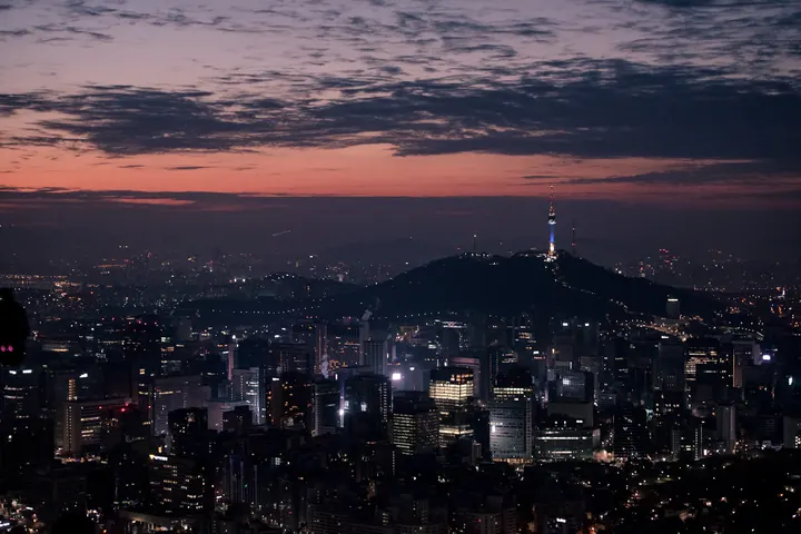 N Seoul Tower above the city skyline before sunrise