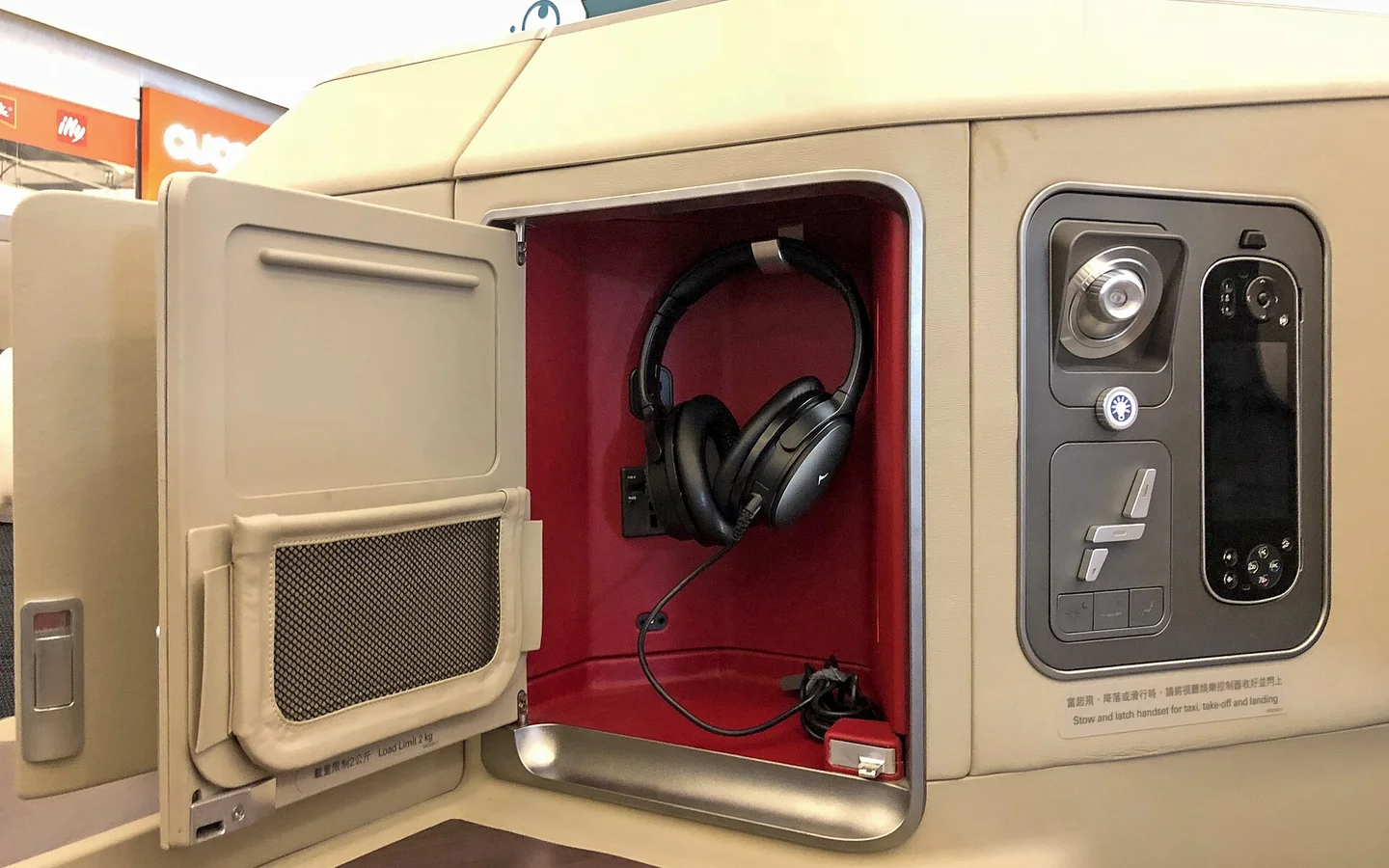 Cathay Pacific Airbus A350 business class seat controls and storage
